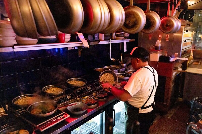 An employee cooks at a restaurant in New York, US, on Thursday, Aug, 22, 2024. Vice President Kamala Harris this month said she would seek to end taxes on tipped income for service industry workers, matching a proposal that her 2024 rival Republican Donald Trump has also made in a bid to court young people and working-class voters. An employee cooks at a restaurant in New York, US, on Thursday, Aug, 22, 2024. Vice President Kamala Harris this month said she would seek to end taxes on tipped income for service industry workers, matching a proposal that her 2024 rival Republican Donald Trump has also made in a bid to court young people and working-class voters.