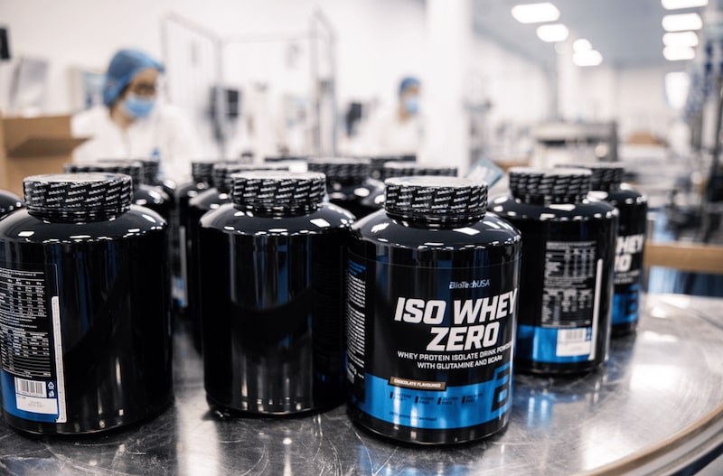 Filled and sealed containers of whey protein formula on the production line at the BioTech USA Kft. manufacturing plant in Szada, Hungary, on Wednesday, Jan. 24, 2024. BioTech USA is one of Europe's largest manufacturers of food supplements. Photographer: Akos Stiller/Bloomberg Filled and sealed containers of whey protein formula on the production line at the BioTech USA Kft. manufacturing plant in Szada, Hungary, on Wednesday, Jan. 24, 2024. BioTech USA is one of Europe's largest manufacturers of food supplements. Photographer: Akos Stiller/Bloomberg