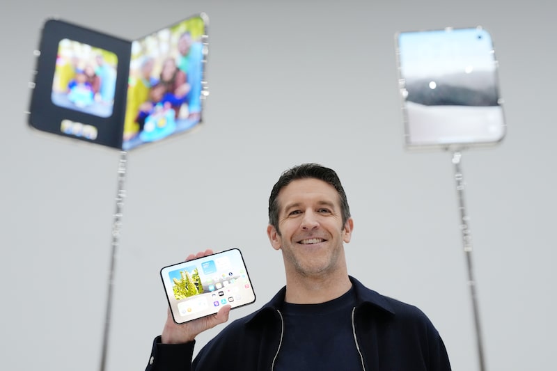 John Ternus, chief executive officer of Apple Inc., holds an iPhone Duo foldable smartphone during a product unveiling event at Apple Park in Cupertino, California, US, on Wednesday, Sept. 9, 2026. Apple Inc. unveiled the companys first foldable smartphone during a wide-ranging event Wednesday, betting that a new category can energize growth for its biggest-selling lineup. Photographer: David Paul Morris/Bloomberg John Ternus, chief executive officer of Apple Inc., holds an iPhone Duo foldable smartphone during a product unveiling event at Apple Park in Cupertino, California, US, on Wednesday, Sept. 9, 2026. Apple Inc. unveiled the companys first foldable smartphone during a wide-ranging event Wednesday, betting that a new category can energize growth for its biggest-selling lineup. Photographer: David Paul Morris/Bloomberg