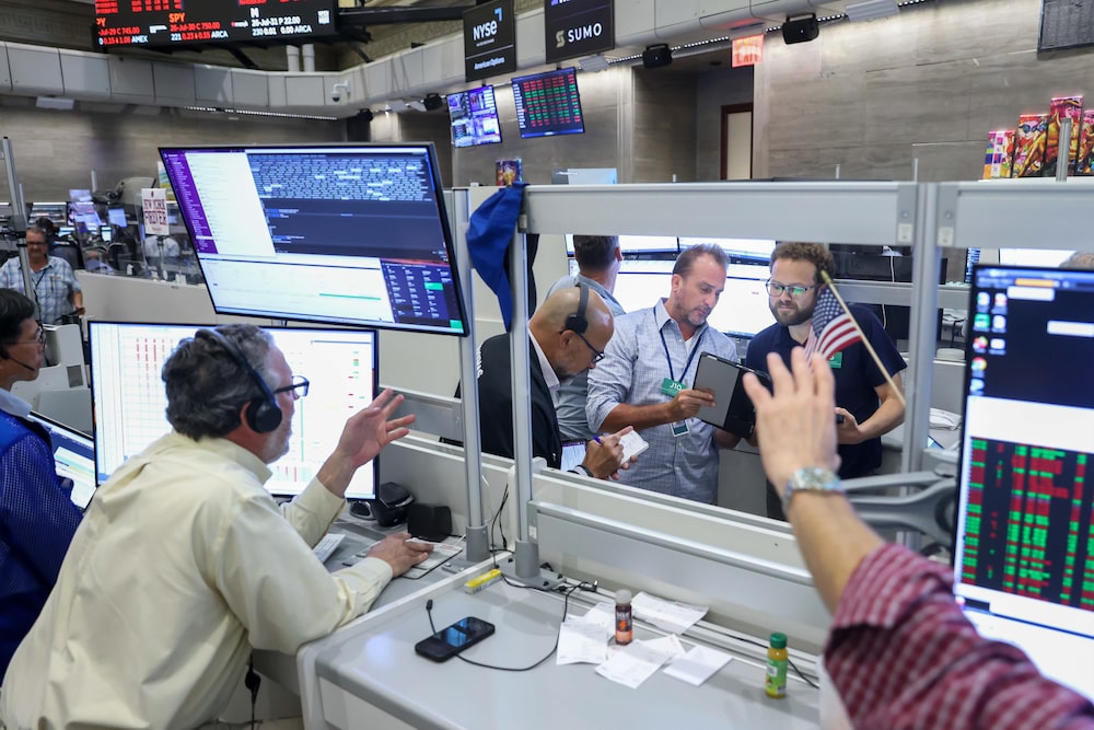 Traders work after a Federal Open Market Committee (FOMC) meeting on the floor of the American Stock Exchange (AMEX) at the New York Stock Exchange (NYSE) in New York, US, on Wednesday, July 29, 2026. Federal Reserve officials left interest rates unchanged, but a fractured vote signaled growing conviction among some policymakers that higher rates are needed to curb resurgent inflation. Photographer: Michael Nagle/Bloomberg Traders work after a Federal Open Market Committee (FOMC) meeting on the floor of the American Stock Exchange (AMEX) at the New York Stock Exchange (NYSE) in New York, US, on Wednesday, July 29, 2026. Federal Reserve officials left interest rates unchanged, but a fractured vote signaled growing conviction among some policymakers that higher rates are needed to curb resurgent inflation. Photographer: Michael Nagle/Bloomberg