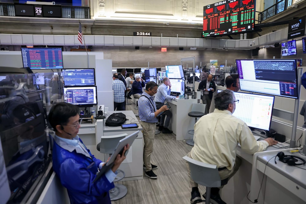 Traders work after a Federal Open Market Committee (FOMC) meeting on the floor of the American Stock Exchange (AMEX) at the New York Stock Exchange (NYSE) in New York, US, on Wednesday, July 29, 2026. Federal Reserve officials left interest rates unchanged, but a fractured vote signaled growing conviction among some policymakers that higher rates are needed to curb resurgent inflation. Photographer: Michael Nagle/Bloomberg Traders work after a Federal Open Market Committee (FOMC) meeting on the floor of the American Stock Exchange (AMEX) at the New York Stock Exchange (NYSE) in New York, US, on Wednesday, July 29, 2026. Federal Reserve officials left interest rates unchanged, but a fractured vote signaled growing conviction among some policymakers that higher rates are needed to curb resurgent inflation. Photographer: Michael Nagle/Bloomberg