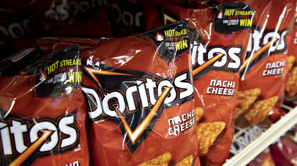 Adeus dedos laranjas: PepsiCo aposta em linha de Doritos e Cheetos sem corante Adeus dedos laranjas: PepsiCo aposta em linha de Doritos e Cheetos sem corante