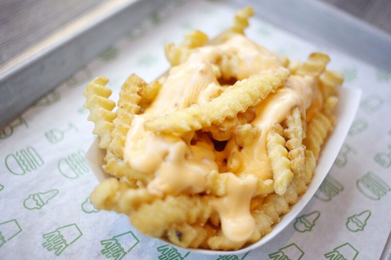 Cheese fries are arranged for a photograph at a Shake Shack Inc. restaurant in Lexington, Kentucky, U.S., on Wednesday, March 6, 2019. Shake Shack is still failing to bring in more diners as it expands outside its home market of New York in the fiercely competitive restaurant space -- the chain plans to open 36 to 40 company-owned U.S. locations in fiscal 2019. Cheese fries are arranged for a photograph at a Shake Shack Inc. restaurant in Lexington, Kentucky, U.S., on Wednesday, March 6, 2019. Shake Shack is still failing to bring in more diners as it expands outside its home market of New York in the fiercely competitive restaurant space -- the chain plans to open 36 to 40 company-owned U.S. locations in fiscal 2019.