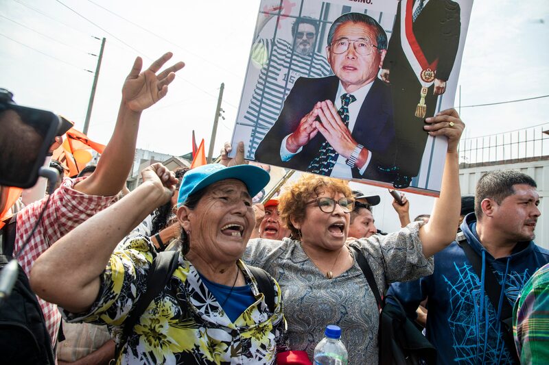 Supporters wait for the release of jailed former President Alberto Fujimori at the Barbadillo prison in Lima, Peru, on Wednesday, Dec. 6, 2023. Peru freed jailed former President Alberto Fujimori on Wednesday evening, in the Andean country's most dramatic challenge yet to an international court that counts all of Latin America's major economies as members. Supporters wait for the release of jailed former President Alberto Fujimori at the Barbadillo prison in Lima, Peru, on Wednesday, Dec. 6, 2023. Peru freed jailed former President Alberto Fujimori on Wednesday evening, in the Andean country's most dramatic challenge yet to an international court that counts all of Latin America's major economies as members.
