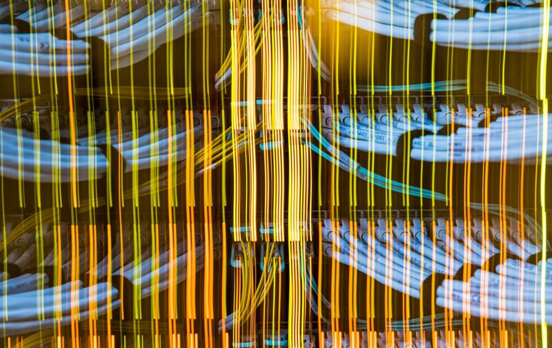 Network switches illuminate fiber optic cables. Photographer: Jason Alden/Bloomberg Network switches illuminate fiber optic cables. Photographer: Jason Alden/Bloomberg