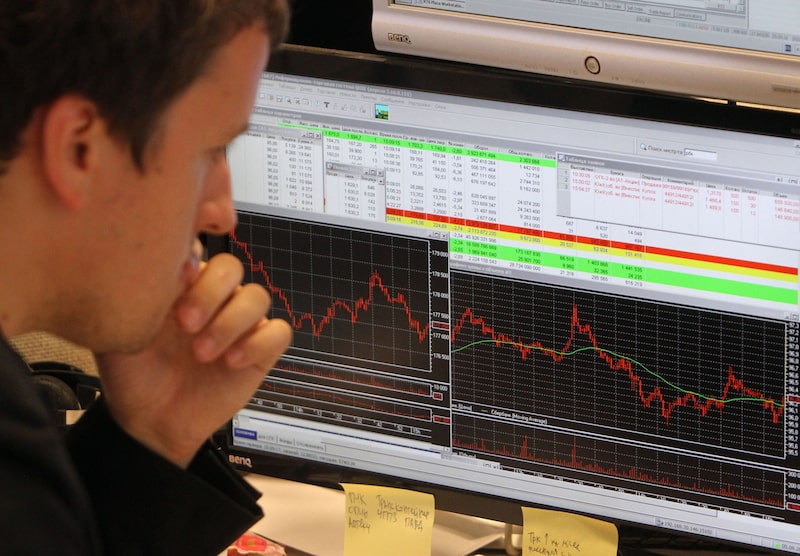 A broker studies a financial index curve on a screen at the Finam brokerage in Moscow, Russia, on Friday, Aug. 5, 2011. Russian stocks sank the most in a year as oil, the country's chief export revenue earner, tumbled on bets fuel demand will falter as the U.S. economy weakens and the European debt crisis worsens. Photographer: Andrey Rudakov/Bloomberg A broker studies a financial index curve on a screen at the Finam brokerage in Moscow, Russia, on Friday, Aug. 5, 2011. Russian stocks sank the most in a year as oil, the country's chief export revenue earner, tumbled on bets fuel demand will falter as the U.S. economy weakens and the European debt crisis worsens. Photographer: Andrey Rudakov/Bloomberg