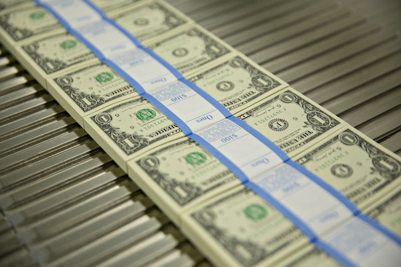 Stacks of $1 dollar notes. Stacks of $1 dollar notes.