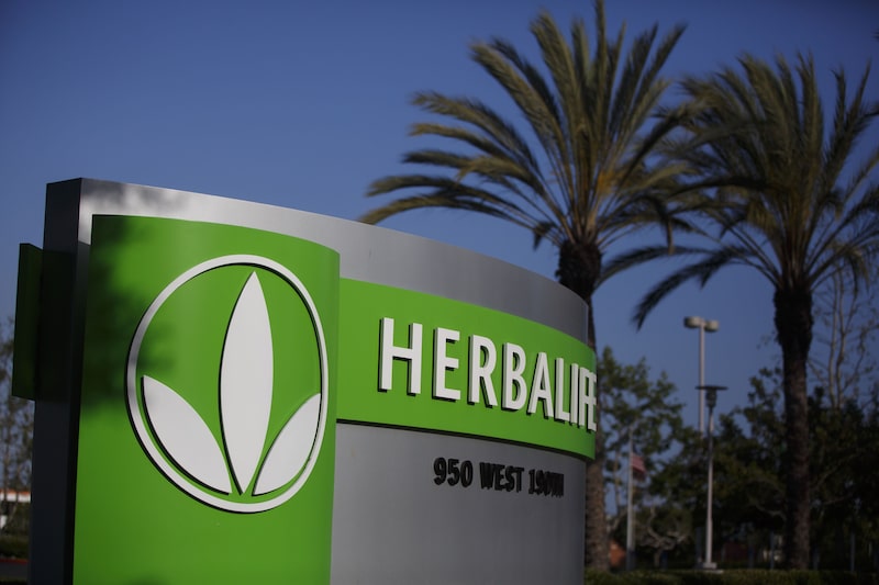 Signage stands outside of the Herbalife Ltd. Plaza in Torrance, California, U.S. Signage stands outside of the Herbalife Ltd. Plaza in Torrance, California, U.S.