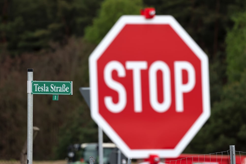 Sign at Teslas factory site in Gruenheide, Germany, in May 2021. Photographer: Liesa Johannssen-Koppitz/Bloomberg Sign at Teslas factory site in Gruenheide, Germany, in May 2021. Photographer: Liesa Johannssen-Koppitz/Bloomberg