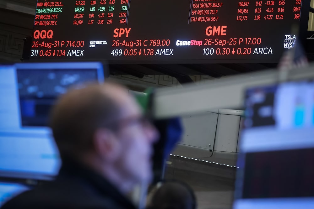 Invesco QQQ ETF, State Street SPDR S&P 500 ETF Trust (SPY), and Gamestop Corp. signage on the floor of the American Stock Exchange (AMEX) at the New York Stock Exchange (NYSE) in New York, US, on Monday, Aug. 31, 2026. A flare-up in geopolitical risks sent stocks and bonds lower as oil climbed, raising concerns about inflationary pressures that could make the Federal Reserve raise interest rates. Photographer: Michael Nagle/Bloomberg Invesco QQQ ETF, State Street SPDR S&P 500 ETF Trust (SPY), and Gamestop Corp. signage on the floor of the American Stock Exchange (AMEX) at the New York Stock Exchange (NYSE) in New York, US, on Monday, Aug. 31, 2026. A flare-up in geopolitical risks sent stocks and bonds lower as oil climbed, raising concerns about inflationary pressures that could make the Federal Reserve raise interest rates. Photographer: Michael Nagle/Bloomberg