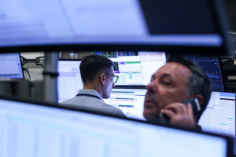 Traders work on the floor of the American Stock Exchange (AMEX) at the New York Stock Exchange (NYSE) in New York, US, on Thursday, July 16, 2026. A selloff in chipmakers dragged down stocks amid concerns over whether massive artificial-intelligence investments will justify lofty valuations, with a resurgence in geopolitical risks also weighing on sentiment. Photographer: Michael Nagle/Bloomberg Traders work on the floor of the American Stock Exchange (AMEX) at the New York Stock Exchange (NYSE) in New York, US, on Thursday, July 16, 2026. A selloff in chipmakers dragged down stocks amid concerns over whether massive artificial-intelligence investments will justify lofty valuations, with a resurgence in geopolitical risks also weighing on sentiment. Photographer: Michael Nagle/Bloomberg