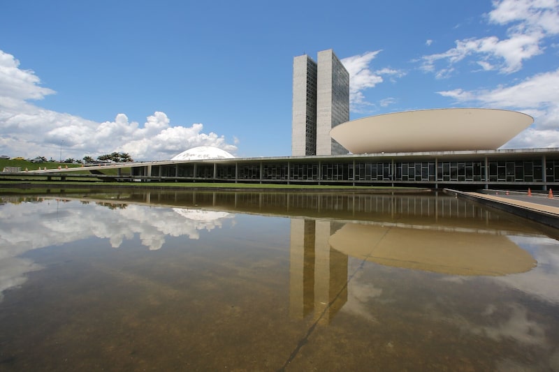 The National Congress building stands in Brasilia, Brazil, on Friday, Oct. 26, 2018. Brazil's presidential candidates wrapped up a campaign marked by violence and division by toning down their attacks and calling for respect and compliance with the law. Photographer: Sergio Lima/Bloomberg The National Congress building stands in Brasilia, Brazil, on Friday, Oct. 26, 2018. Brazil's presidential candidates wrapped up a campaign marked by violence and division by toning down their attacks and calling for respect and compliance with the law. Photographer: Sergio Lima/Bloomberg