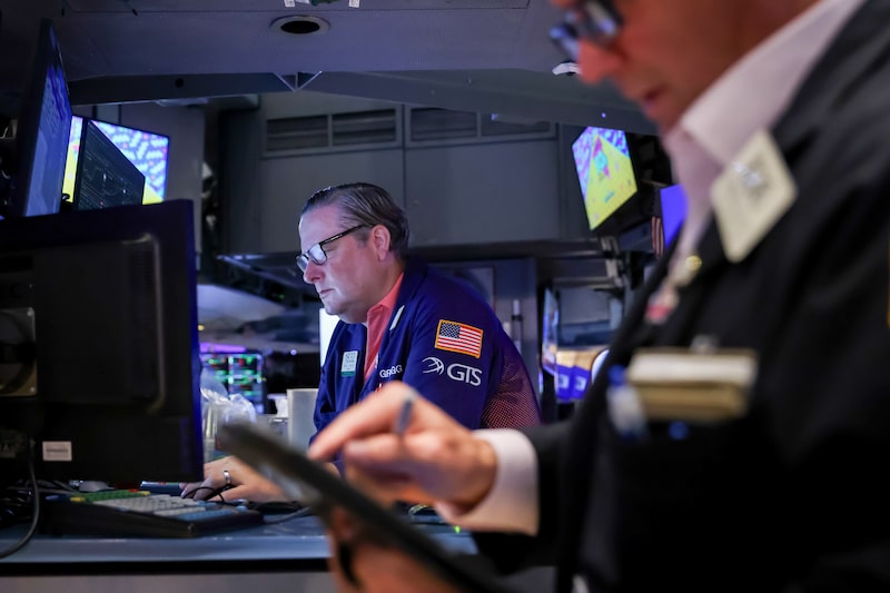 Traders work on the floor of the New York Stock Exchange (NYSE) in New York, US, on Wednesday, Aug. 19, 2026. Wall Street staged a rebound after the Treasury said it plans to boost buybacks of longer-dated bonds, a signal the US wants to lower borrowing costs after yields hit multi-decade highs. Photographer: Michael Nagle/Bloomberg Traders work on the floor of the New York Stock Exchange (NYSE) in New York, US, on Wednesday, Aug. 19, 2026. Wall Street staged a rebound after the Treasury said it plans to boost buybacks of longer-dated bonds, a signal the US wants to lower borrowing costs after yields hit multi-decade highs. Photographer: Michael Nagle/Bloomberg