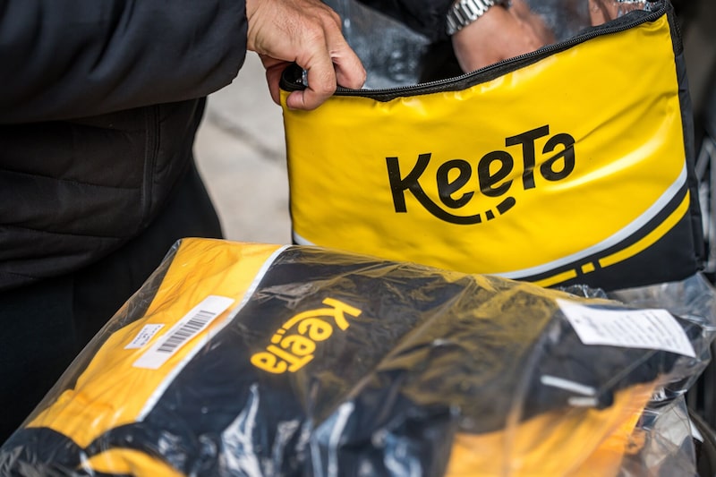 Plano da Keeta teria se baseado em uma estratégia de concorrência desleal com o objetivo de minar a posição do iFood, segundo a acusação (Foto: Lam Yik/Bloomberg) Plano da Keeta teria se baseado em uma estratégia de concorrência desleal com o objetivo de minar a posição do iFood, segundo a acusação (Foto: Lam Yik/Bloomberg)