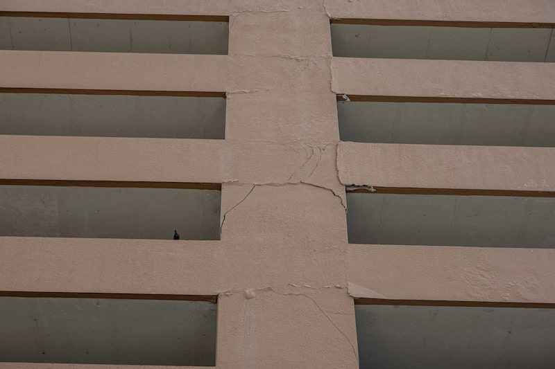 Cracks on the facade of a building following an earthquake in Bangkok, Thailand, Friday, March 28, 2025. Myanmar was struck by its biggest earthquake in a century, shaking buildings and triggering evacuations in neighboring Vietnam and Thailand, with at least one tower collapsing in Bangkok and reports of several casualties. Photographer: Andre Malerba/Bloomberg Cracks on the facade of a building following an earthquake in Bangkok, Thailand, Friday, March 28, 2025. Myanmar was struck by its biggest earthquake in a century, shaking buildings and triggering evacuations in neighboring Vietnam and Thailand, with at least one tower collapsing in Bangkok and reports of several casualties. Photographer: Andre Malerba/Bloomberg