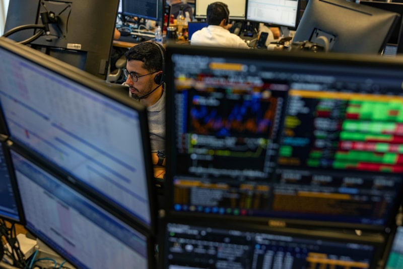 Employees work on the trading floor at the Genial Investments headquarters in Sao Paulo, Brazil, on Wednesday, Aug. 5, 2026. Brazilian economists cut their 2026 year-end benchmark interest rate forecast as Latin America's largest economy shows mounting signs of cooling down. Photographer: Victor Moriyama/Bloomberg Employees work on the trading floor at the Genial Investments headquarters in Sao Paulo, Brazil, on Wednesday, Aug. 5, 2026. Brazilian economists cut their 2026 year-end benchmark interest rate forecast as Latin America's largest economy shows mounting signs of cooling down. Photographer: Victor Moriyama/Bloomberg