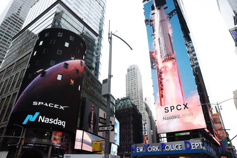 SpaceX signage during the company's initial public offering in June. SpaceX signage during the company's initial public offering in June.