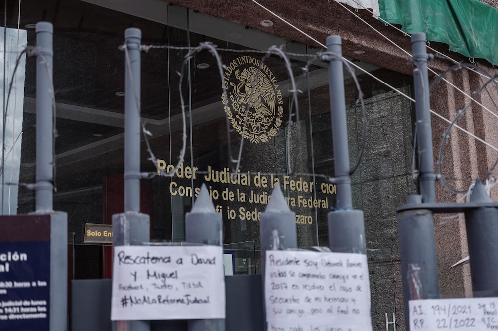 Security fencing in front of the Federal Judicial Branch building during a strike in Mexico City, Mexico, on Tuesday, Aug.20, 2024. Mexican judiciary workers went on strike over President Andres Manuel Lopez Obrador's proposed overhaul of the country's judicial system, which opponents say would undermine the judiciary and erode limits on the ruling party's power. Photographer: Luis Antonio Rojas/Bloomberg Security fencing in front of the Federal Judicial Branch building during a strike in Mexico City, Mexico, on Tuesday, Aug.20, 2024. Mexican judiciary workers went on strike over President Andres Manuel Lopez Obrador's proposed overhaul of the country's judicial system, which opponents say would undermine the judiciary and erode limits on the ruling party's power. Photographer: Luis Antonio Rojas/Bloomberg