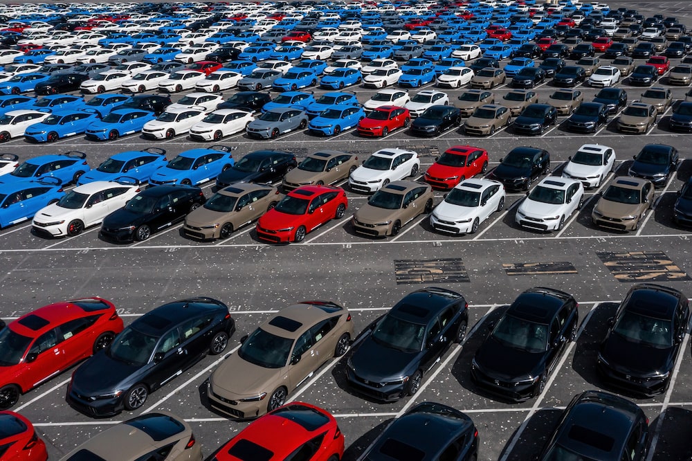 New Honda vehicles in a storage lot at Auto Warehousing Co. in Richmond, California, US, on Monday, Sept. 8, 2025. Japanese auto shares climbed in Tokyo after Donald Trump signed an executive order confirming a deal that limits US tariffs on the sector to 15%, lifting investor sentiment. Photographer: David Paul Morris/Bloomberg New Honda vehicles in a storage lot at Auto Warehousing Co. in Richmond, California, US, on Monday, Sept. 8, 2025. Japanese auto shares climbed in Tokyo after Donald Trump signed an executive order confirming a deal that limits US tariffs on the sector to 15%, lifting investor sentiment. Photographer: David Paul Morris/Bloomberg