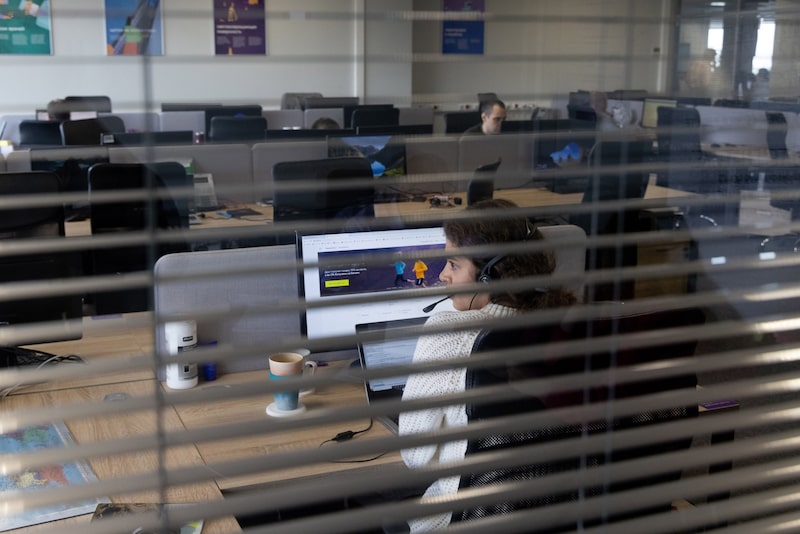 Employees at computers inside a Renaissance Insurance office in Moscow, Russia, on Wednesday, Sept. 15, 2021. A Russian insurance company backed by billionaire Roman Abramovich has picked banks to prepare it for an initial public offering, according to two people familiar with the matter. Photographer: Andrey Rudakov/Bloomberg Employees at computers inside a Renaissance Insurance office in Moscow, Russia, on Wednesday, Sept. 15, 2021. A Russian insurance company backed by billionaire Roman Abramovich has picked banks to prepare it for an initial public offering, according to two people familiar with the matter. Photographer: Andrey Rudakov/Bloomberg
