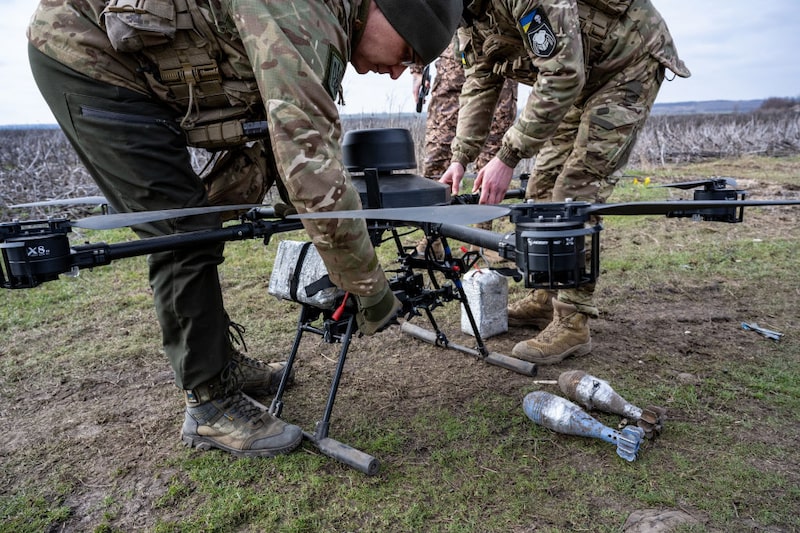 UNSPECIFIED, UKRAINE - FEBRUARY 21: Ukrainian soldiers of the 108th Territorial Defense Brigade test fly a Ukrainian-made Vampire drone, with six rotors, night vision and thermal imaging capabilities, and capable of carrying four 82mm artillery shells, near the southern frontline on February 21, 2024 in UNSPECIFIED, Zaporizhzhia Oblast, Ukraine. Russian forces have been mounting multiple attacks each day along the 600-mile frontline, while Ukrainian troops grapple with a shortage of ammunition and manpower. (Photo by Scott Peterson/Getty Images) Photographer: Scott Peterson/Getty Images Europe UNSPECIFIED, UKRAINE - FEBRUARY 21: Ukrainian soldiers of the 108th Territorial Defense Brigade test fly a Ukrainian-made Vampire drone, with six rotors, night vision and thermal imaging capabilities, and capable of carrying four 82mm artillery shells, near the southern frontline on February 21, 2024 in UNSPECIFIED, Zaporizhzhia Oblast, Ukraine. Russian forces have been mounting multiple attacks each day along the 600-mile frontline, while Ukrainian troops grapple with a shortage of ammunition and manpower. (Photo by Scott Peterson/Getty Images) Photographer: Scott Peterson/Getty Images Europe