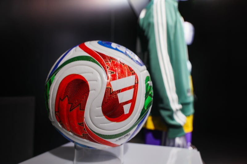 A display of an Adidas AG official football for FIFA World Cup 2026 at the company's headquarters in Herzogenaurach, Germany, on Wednesday, March 4, 2026. Adidas forecast higher profits this year and market share gains through 2028 as the German brand looks to maintain its momentum with retro sneakers and new running and football products. Photographer: Alex Kraus/Bloomberg A display of an Adidas AG official football for FIFA World Cup 2026 at the company's headquarters in Herzogenaurach, Germany, on Wednesday, March 4, 2026. Adidas forecast higher profits this year and market share gains through 2028 as the German brand looks to maintain its momentum with retro sneakers and new running and football products. Photographer: Alex Kraus/Bloomberg