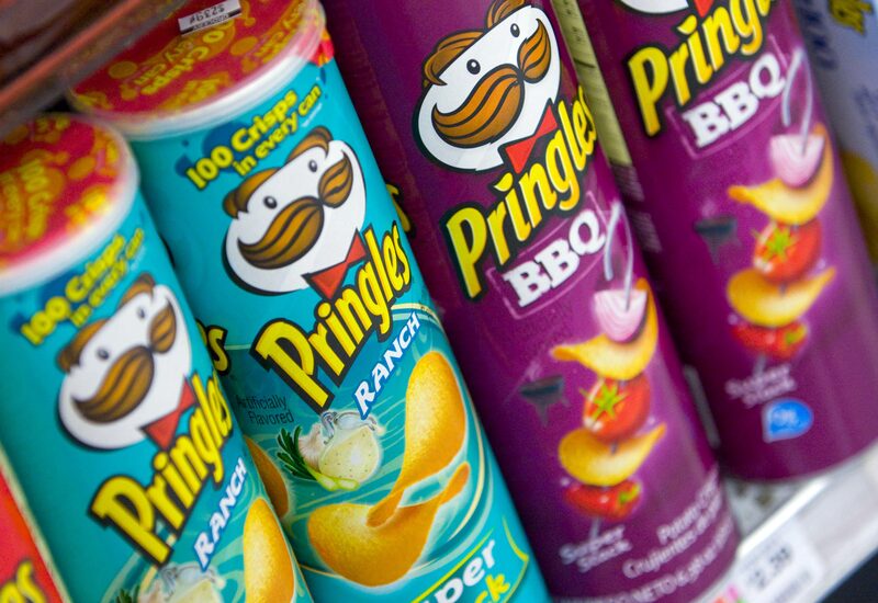 Procter & Gamble Co.'s Pringles brand crisps sit on the shelf at a supermarket in New York, U.S., on Friday, Dec. 11, 2009. Procter & Gamble Co., the world's largest consumer-goods company, agreed to buy Sara Lee Corp.'s Ambi Pur brand for about 320 million euros ($472 million) to boost air-freshener sales outside the U.S. Procter & Gamble Co.'s Pringles brand crisps sit on the shelf at a supermarket in New York, U.S., on Friday, Dec. 11, 2009. Procter & Gamble Co., the world's largest consumer-goods company, agreed to buy Sara Lee Corp.'s Ambi Pur brand for about 320 million euros ($472 million) to boost air-freshener sales outside the U.S.