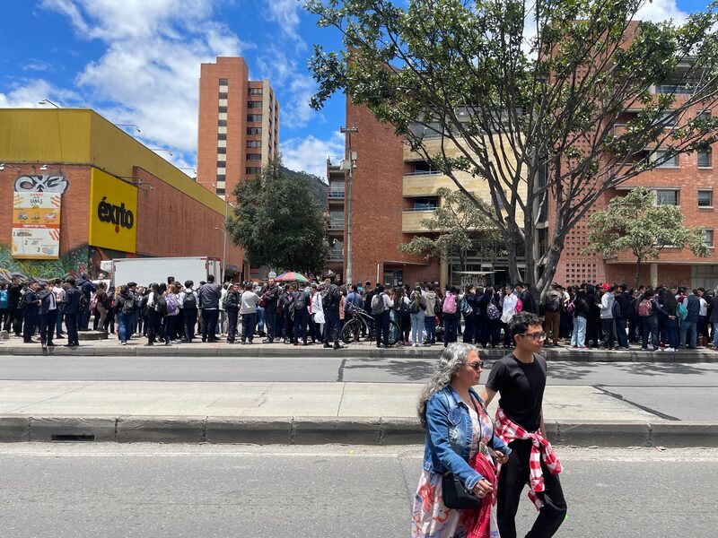 People gather in the street in Colombia's capital Bogotá following an earthquake around midday Thursday. People gather in the street in Colombia's capital Bogotá following an earthquake around midday Thursday.