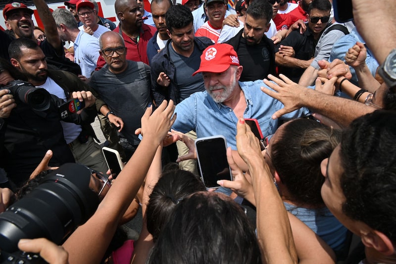 Luiz Inacio Lula da Silva greets supporters during a campaign rally. Luiz Inacio Lula da Silva greets supporters during a campaign rally.
