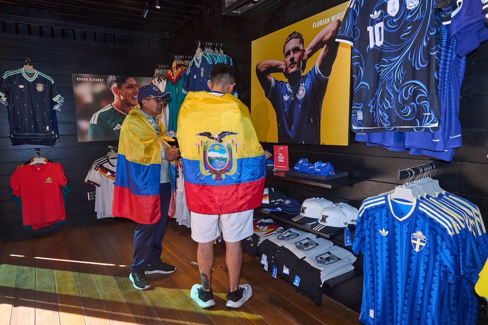 Adidas merchandise for sale at a FIFA World Cup 2026 watch party hosted by Adidas at Brooklyn Bridge Park in the Brooklyn borough of New York, US, on Tuesday, June 16, 2026. The World Cup is back in the US for the first time since 1994 in its biggest version yet, encompassing 48 teams and 104 matches that are also being played in neighboring Canada and Mexico. Photographer: Bing Guan/Bloomberg Adidas merchandise for sale at a FIFA World Cup 2026 watch party hosted by Adidas at Brooklyn Bridge Park in the Brooklyn borough of New York, US, on Tuesday, June 16, 2026. The World Cup is back in the US for the first time since 1994 in its biggest version yet, encompassing 48 teams and 104 matches that are also being played in neighboring Canada and Mexico. Photographer: Bing Guan/Bloomberg