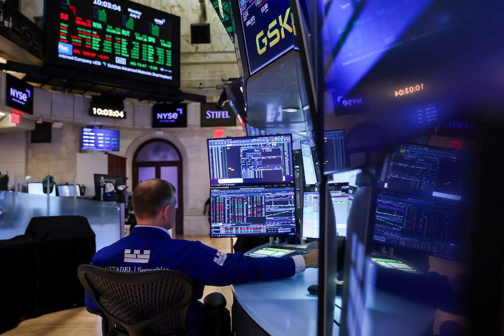 A trader works on the floor of the New York Stock Exchange (NYSE) in New York, US, on Monday, July 6, 2026. US President Donald Trump rang the opening bell for the New York Stock Exchange and the Nasdaq from the Oval Office on Monday, a celebratory event to mark the launch of Trump Accounts, a new investment vehicle for children. Photographer: Michael Nagle/Bloomberg A trader works on the floor of the New York Stock Exchange (NYSE) in New York, US, on Monday, July 6, 2026. US President Donald Trump rang the opening bell for the New York Stock Exchange and the Nasdaq from the Oval Office on Monday, a celebratory event to mark the launch of Trump Accounts, a new investment vehicle for children. Photographer: Michael Nagle/Bloomberg