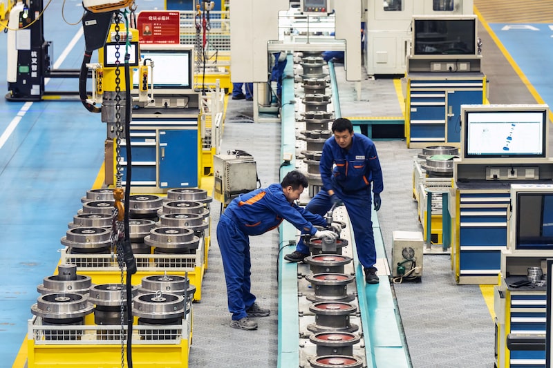 Trabajadores en China. Trabajadores en China.