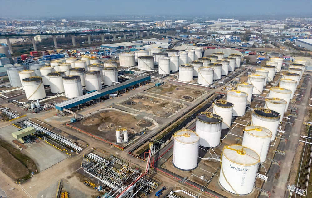 Storage tanks for transport fuels and petroleum products at the Navigator Thames oil depot terminal on the outskirts of London, UK, on Monday, March 23, 2026. Brent crude plunged from $112 a barrel to as low as about $96 a barrel as US President Donald Trump signaled negotiations were underway even as Iran denied the talks. Photographer: Jason Alden/Bloomberg Storage tanks for transport fuels and petroleum products at the Navigator Thames oil depot terminal on the outskirts of London, UK, on Monday, March 23, 2026. Brent crude plunged from $112 a barrel to as low as about $96 a barrel as US President Donald Trump signaled negotiations were underway even as Iran denied the talks. Photographer: Jason Alden/Bloomberg