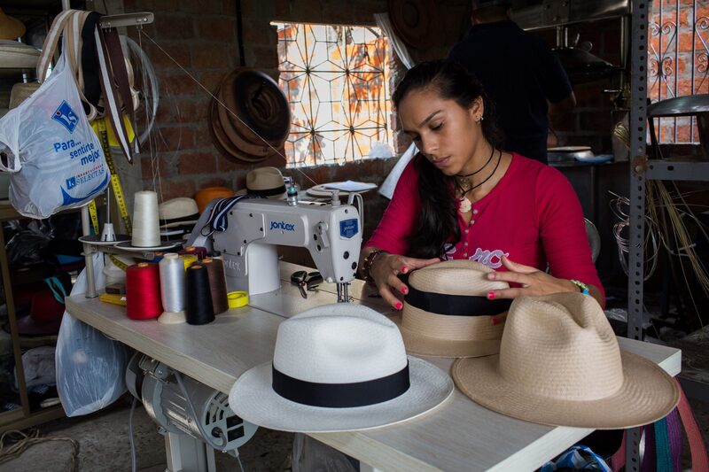 A woman sews a ribbon to a Montecristi superfino hat in Montecristi, Ecuador, on Thursday, Feb. 8, 2018. The Central Bank of Ecuador is scheduled to release Gross Domestic Product (GDP) figures on March 13. Photographer: Eduardo Leal/Bloomberg A woman sews a ribbon to a Montecristi superfino hat in Montecristi, Ecuador, on Thursday, Feb. 8, 2018. The Central Bank of Ecuador is scheduled to release Gross Domestic Product (GDP) figures on March 13. Photographer: Eduardo Leal/Bloomberg