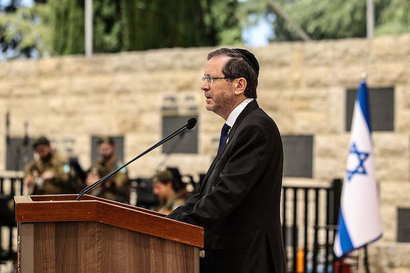 Israel's President Isaac Herzog addresses a ceremony commemorating Israel's Remembrance Day for fallen soldiers, or Yom HaZikaron, at the Military Cemetery on Mount Herzl in Jerusalem on April 21, 2026. Israel's President Isaac Herzog addresses a ceremony commemorating Israel's Remembrance Day for fallen soldiers, or Yom HaZikaron, at the Military Cemetery on Mount Herzl in Jerusalem on April 21, 2026.