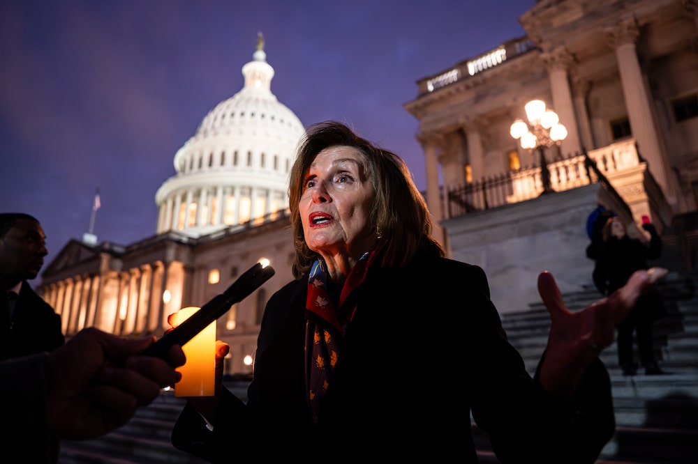 Representative Nancy Pelosi, a Democrat from California, speaks with members of the media following an event on the East Front steps to mark five years since the January 6, 2021, attack on the US Capitol in Washington, DC, US, on Tuesday, Jan. 6, 2026. Almost 400 people pardoned or granted clemency by President Donald Trump in connection with the Jan. 6, 2021, attack on the US Capitol are now seeking millions of dollars in payouts from the federal government, according to their lawyer. Photographer: Al Drago/Bloomberg Representative Nancy Pelosi, a Democrat from California, speaks with members of the media following an event on the East Front steps to mark five years since the January 6, 2021, attack on the US Capitol in Washington, DC, US, on Tuesday, Jan. 6, 2026. Almost 400 people pardoned or granted clemency by President Donald Trump in connection with the Jan. 6, 2021, attack on the US Capitol are now seeking millions of dollars in payouts from the federal government, according to their lawyer. Photographer: Al Drago/Bloomberg
