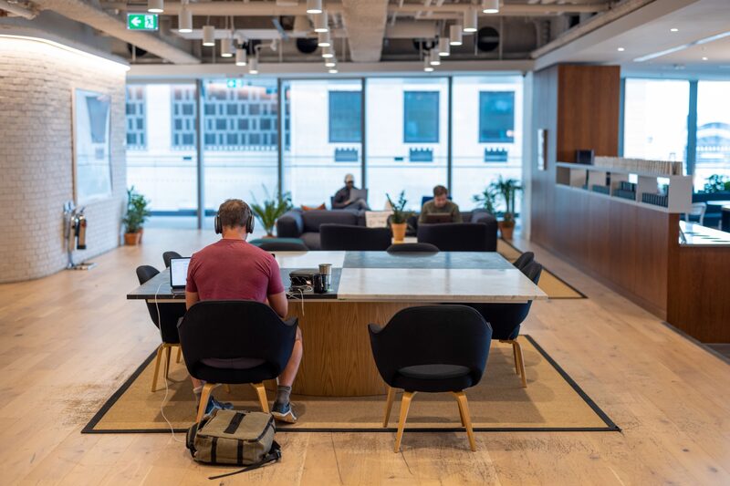 Office workers at desks in a WeWork co-working office space in the Waterloo district in London, U.K. on Monday, Aug. 2, 2021. A survey this month showed that just 17% of Londons white-collar workers want a full-time return, and many said itd take a pay rise to get them back five days a week. Photographer: Jason Alden/Bloomberg Office workers at desks in a WeWork co-working office space in the Waterloo district in London, U.K. on Monday, Aug. 2, 2021. A survey this month showed that just 17% of Londons white-collar workers want a full-time return, and many said itd take a pay rise to get them back five days a week. Photographer: Jason Alden/Bloomberg
