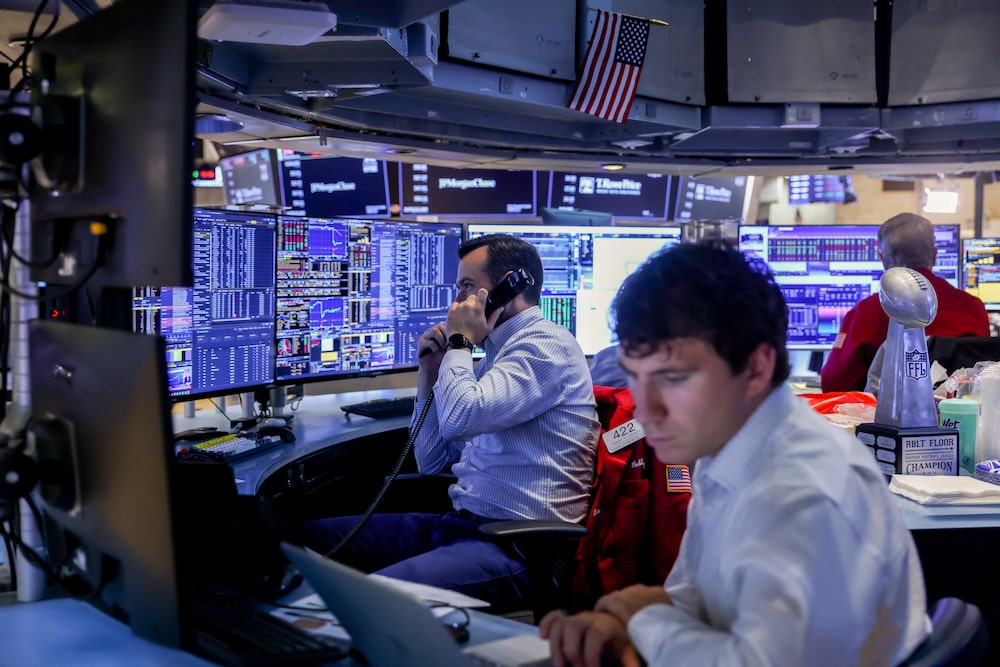 Traders work after a Federal Open Market Committee (FOMC) meeting on the floor of the New York Stock Exchange (NYSE) in New York, US, on Wednesday, July 29, 2026. Federal Reserve officials left interest rates unchanged, but a fractured vote signaled growing conviction among some policymakers that higher rates are needed to curb resurgent inflation. Photographer: Michael Nagle/Bloomberg Traders work after a Federal Open Market Committee (FOMC) meeting on the floor of the New York Stock Exchange (NYSE) in New York, US, on Wednesday, July 29, 2026. Federal Reserve officials left interest rates unchanged, but a fractured vote signaled growing conviction among some policymakers that higher rates are needed to curb resurgent inflation. Photographer: Michael Nagle/Bloomberg