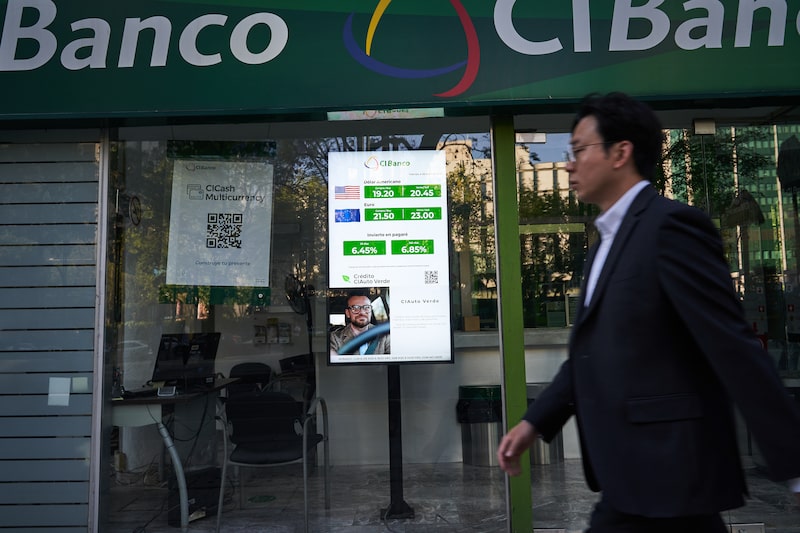 Foreign exchange rates displayed outside a CIBanco branch in Mexico City, Mexico, on Friday, April 4, 2025. The Mexican currency slipped 2.4% at the start of US trading hours, leading losses in emerging markets as fallout from US tariffs continues to reverberate in global markets. Photographer: Mauricio Palos/Bloomberg Foreign exchange rates displayed outside a CIBanco branch in Mexico City, Mexico, on Friday, April 4, 2025. The Mexican currency slipped 2.4% at the start of US trading hours, leading losses in emerging markets as fallout from US tariffs continues to reverberate in global markets. Photographer: Mauricio Palos/Bloomberg