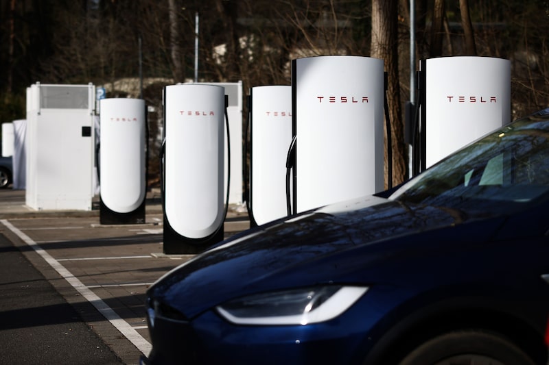 A Tesla Inc. supercharger station in Beelitz, Germany, on Tuesday, March 4, 2025. Tesla's registrations plummeted in Germany last month as Chief Executive Officer Elon Musk irked voters taking part in the country's closely contested federal election. Photographer: Liesa Johannssen/Bloomberg A Tesla Inc. supercharger station in Beelitz, Germany, on Tuesday, March 4, 2025. Tesla's registrations plummeted in Germany last month as Chief Executive Officer Elon Musk irked voters taking part in the country's closely contested federal election. Photographer: Liesa Johannssen/Bloomberg