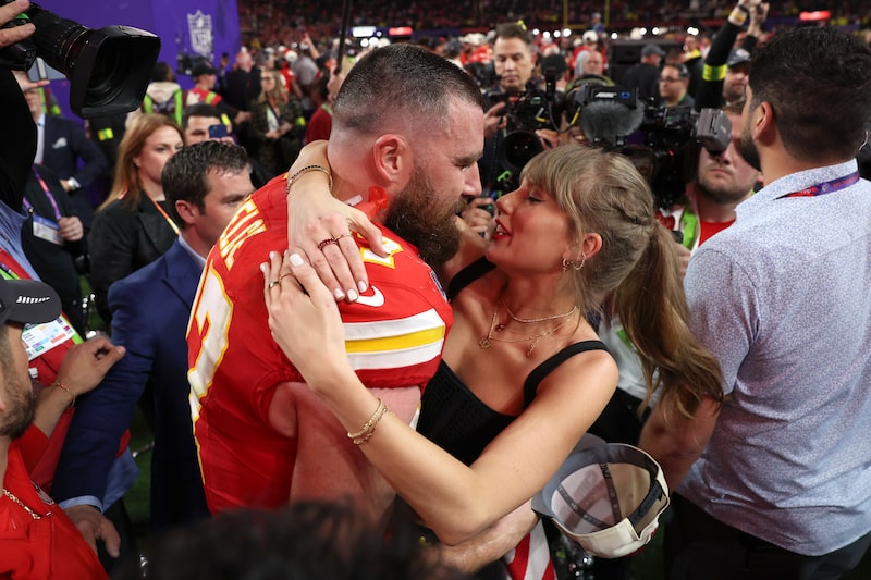 Travis Kelce kisses Taylor Swift after defeating the San Francisco 49ers 25-22 in overtime during Super Bowl LVIII in Las Vegas in 2024. Photographer: Ezra Shaw/Getty Images Travis Kelce kisses Taylor Swift after defeating the San Francisco 49ers 25-22 in overtime during Super Bowl LVIII in Las Vegas in 2024. Photographer: Ezra Shaw/Getty Images