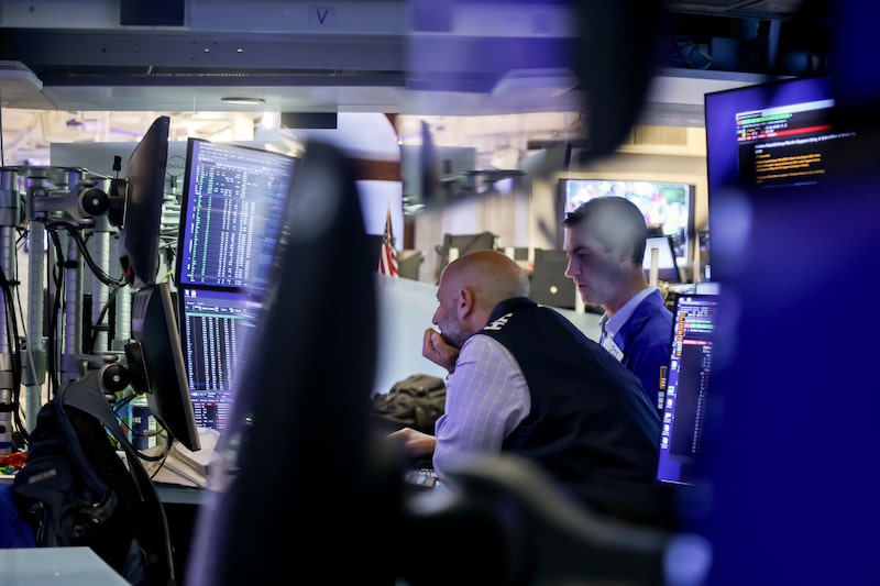 Traders work on the floor of the New York Stock Exchange (NYSE) in New York, US, on Monday, July 14, 2025. US stocks extended declines Monday to fall further from records, as President Donald Trump's latest salvo of tariff threats for Europe and Mexico kept investors on edge as corporate earnings season kicks off this week. Photographer: Michael Nagle/Bloomberg Traders work on the floor of the New York Stock Exchange (NYSE) in New York, US, on Monday, July 14, 2025. US stocks extended declines Monday to fall further from records, as President Donald Trump's latest salvo of tariff threats for Europe and Mexico kept investors on edge as corporate earnings season kicks off this week. Photographer: Michael Nagle/Bloomberg