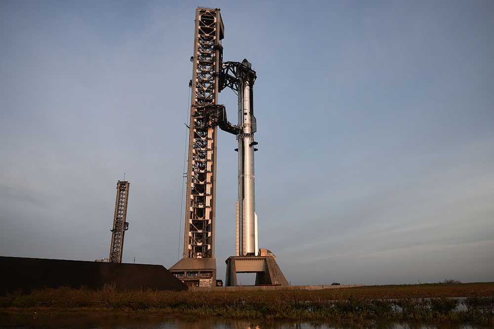 La nave 40 está colocada sobre el propulsor 20 en preparación para el vuelo 13 en las instalaciones de SpaceX en el sur de Texas, en el condado de Cameron, Texas, el 22 de julio de 2026. La nave 40 está colocada sobre el propulsor 20 en preparación para el vuelo 13 en las instalaciones de SpaceX en el sur de Texas, en el condado de Cameron, Texas, el 22 de julio de 2026.
