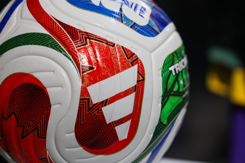 An Adidas AG official football for FIFA World Cup 2026 at the company's headquarters in Herzogenaurach, Germany, on Wednesday, March 4, 2026. Adidas forecast higher profits this year and market share gains through 2028 as the German brand looks to maintain its momentum with retro sneakers and new running and football products. Photographer: Alex Kraus/Bloomberg An Adidas AG official football for FIFA World Cup 2026 at the company's headquarters in Herzogenaurach, Germany, on Wednesday, March 4, 2026. Adidas forecast higher profits this year and market share gains through 2028 as the German brand looks to maintain its momentum with retro sneakers and new running and football products. Photographer: Alex Kraus/Bloomberg