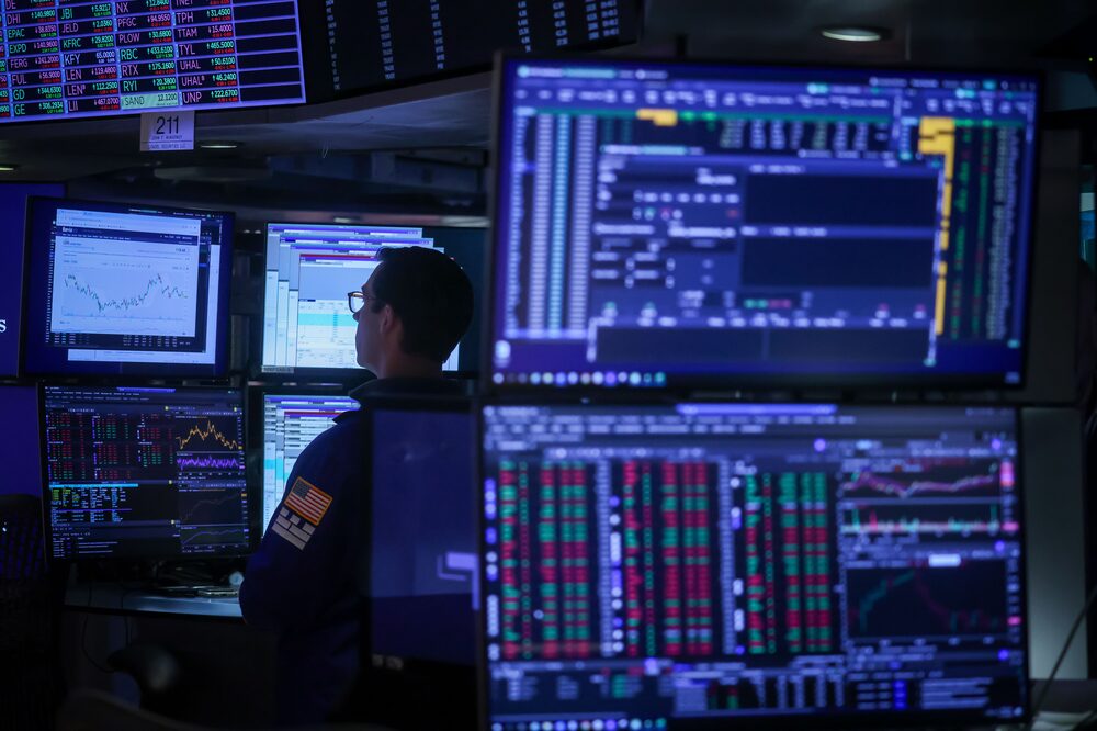 Traders At The New York Stock Exchange As Wall Street On Hold In Run-Up To Nvidia, Jobs Data Traders At The New York Stock Exchange As Wall Street On Hold In Run-Up To Nvidia, Jobs Data