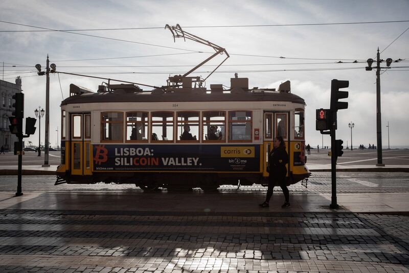 An electric tram passes a street crossing in Lisbon, Portugal, on Tuesday, Jan. 11, 2022. An electric tram passes a street crossing in Lisbon, Portugal, on Tuesday, Jan. 11, 2022.