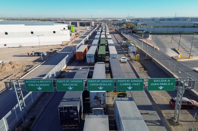 Tractor trailers wait in line at the Ysleta-Zaragoza International Bridge port of entry, on the US-Mexico border in Juarez, Chihuahua state, Mexico. Tractor trailers wait in line at the Ysleta-Zaragoza International Bridge port of entry, on the US-Mexico border in Juarez, Chihuahua state, Mexico.