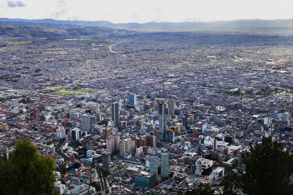 City buildings are seen from Cerro de Monserrate in Bogota, Colombia, on Tuesday, June 16, 2015. Colombia's fiscal deficit will widen next year to the most since 2010 amid lower crude prices, according to the government's latest financial plan. Photographer: Cassi Alexandra/Bloomberg City buildings are seen from Cerro de Monserrate in Bogota, Colombia, on Tuesday, June 16, 2015. Colombia's fiscal deficit will widen next year to the most since 2010 amid lower crude prices, according to the government's latest financial plan. Photographer: Cassi Alexandra/Bloomberg