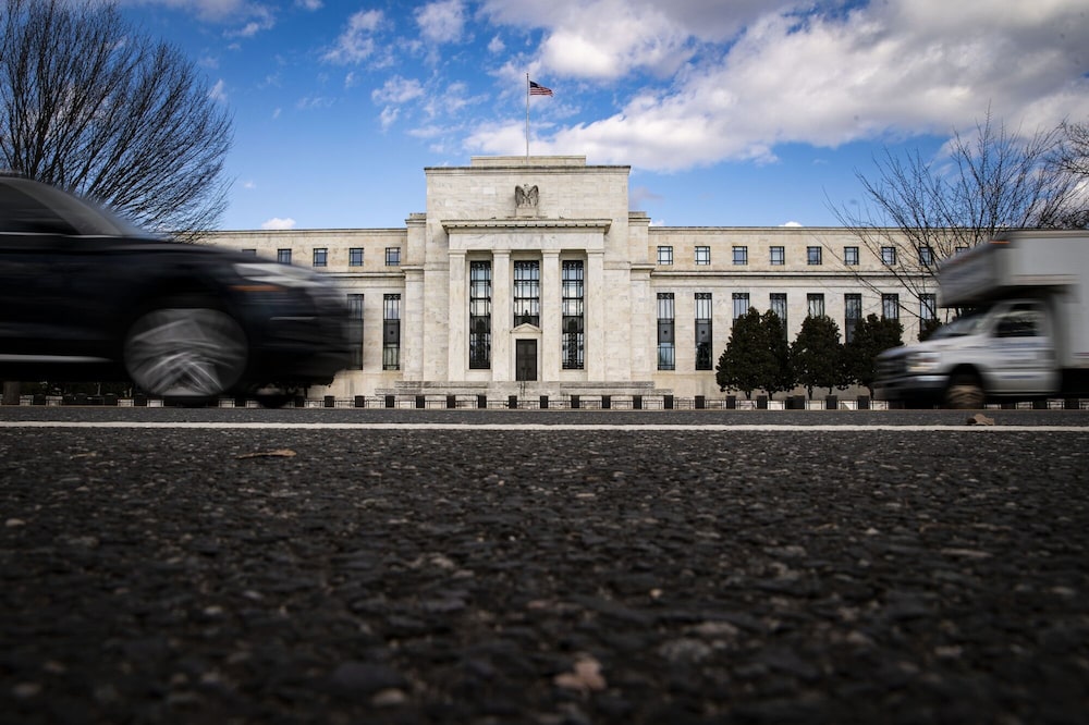 Vehicles pass in front of the Marriner S. Eccles Federal Reserve building in Washington. Photographer: Al Drago/Bloomberg Vehicles pass in front of the Marriner S. Eccles Federal Reserve building in Washington. Photographer: Al Drago/Bloomberg