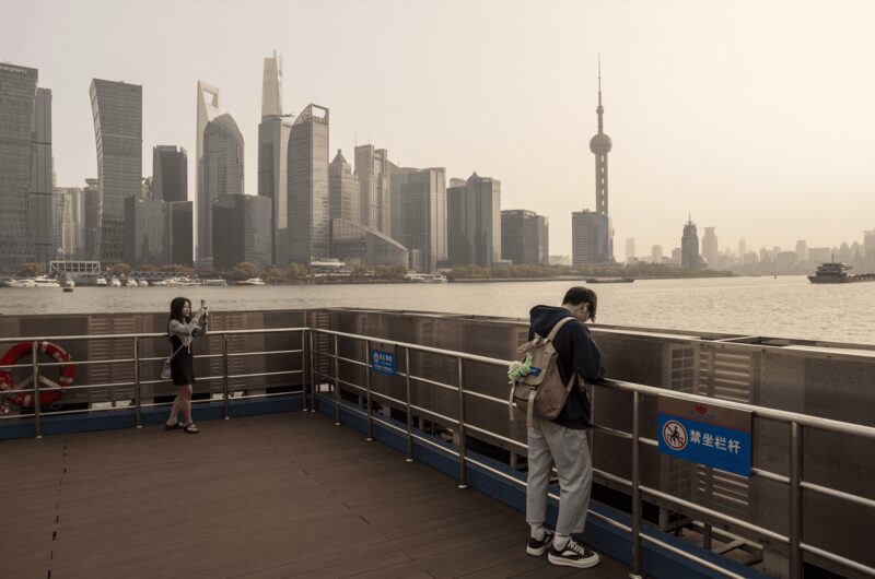 Passengers ride a ferry across the Huangpu River past buildings in Pudong's Lujiazui Financial District in Shanghai, China, on Monday, April 15, 2024. China's economic growth beat expectations in the first quarter as the industrial sector powered forward, although a tail-off in March activity signaled more support may be needed to sustain that momentum. Photographer: Raul Ariano/Bloomberg P Passengers ride a ferry across the Huangpu River past buildings in Pudong's Lujiazui Financial District in Shanghai, China, on Monday, April 15, 2024. China's economic growth beat expectations in the first quarter as the industrial sector powered forward, although a tail-off in March activity signaled more support may be needed to sustain that momentum. Photographer: Raul Ariano/Bloomberg P